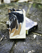 Load image into Gallery viewer, Handmade goat milk soap bar called High Peaks Mountain Man, infused with fir balsam, cypress, and cedarwood essential oils for a rugged woodsy scent
