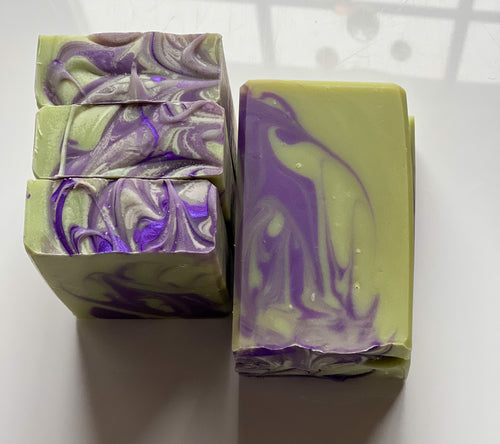 White Sage scented goat milk soap.  Green with purple swirls